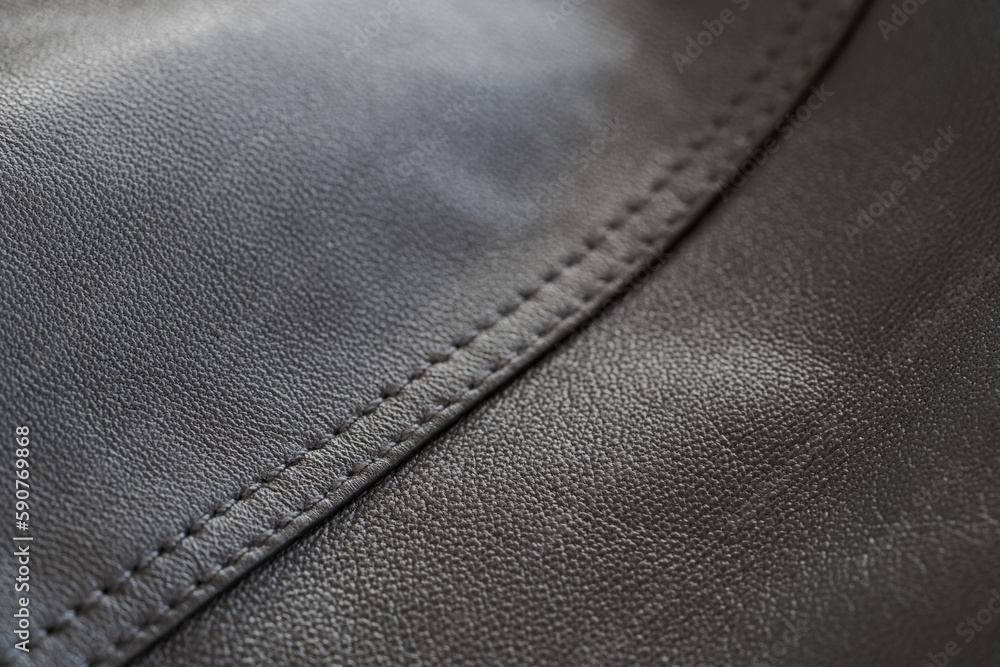 Wall mural Detail shot of supple leather jacket with stitching - Wall murals