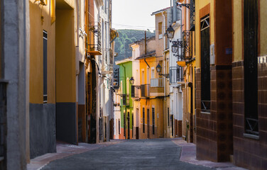 Fototapeta na wymiar Beautiful narrow street in Catamarruch town, Alicante (Spain).