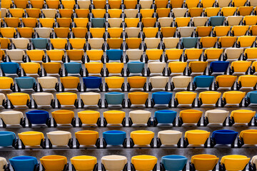 Fototapeta premium Football and soccer stadium empty tribune colorful seats
