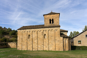 Fototapeta na wymiar San Caprasio romanesque church in the beautiful village of Santa Cruz de la Seros in a sunny day in Huesca, Aragón, Spain.