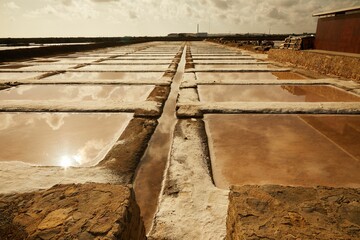 Close-up shot of separated salt pans in Faro