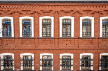 Fototapeta premium An old two-storey red brick house.