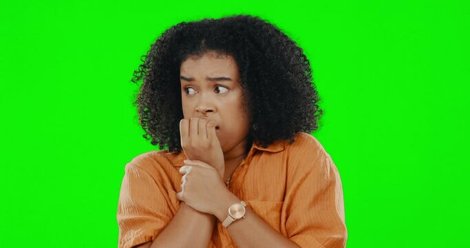 Stress, shock and face of a woman on a green screen isolated on a studio background. Anxiety, nervous and portrait of a girl stressing, looking scared and anxious with surprise on a backdrop