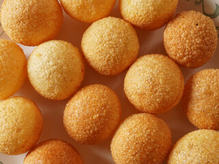 Closeup top view of hollow balls of deep fried pani puri, a famous street food in India.  