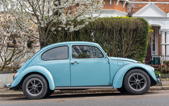 London, United Kingdom, 03.04.2023, A classic Volkswagen Beetle car in blue colour parked in the street