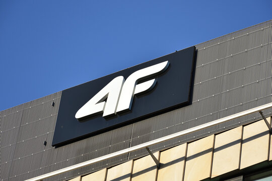 4F signage, logo on the facade of 4F office, clothing brand retailer chain. WARSAW, POLAND - MAY 11, 2021