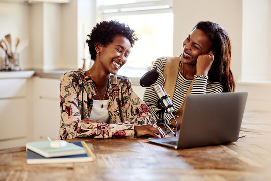 Laughing friends doing a podcast