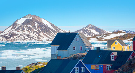 Panoramic view of colorful Kulusuk village in East Greenland - Kulusuk, Greenland - Melting of a...