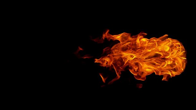 Super slow motion of fire isolated on black background. Filmed on high speed cinema camera at 1000 fps