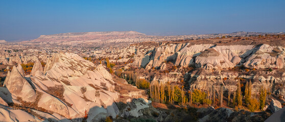 Rocks mushrooms in dove valley sunset autumn in Cappadocia, Turkey. Landscape from aerial top view