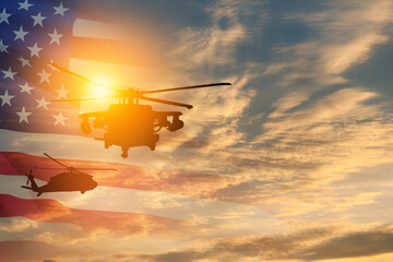 Silhouettes of helicopters on background of sunset with a transparent American flag. © hamara
