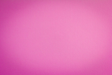 Pink paper background with vignette.The texture of thick pink paper for creativity.A place to copy.