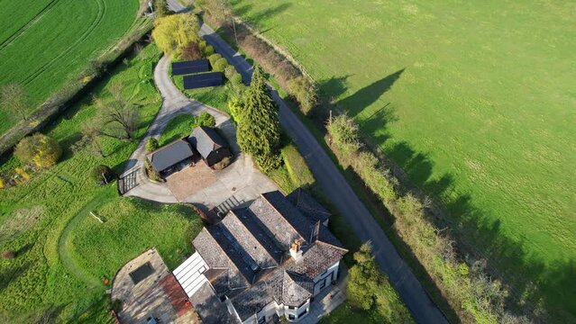 High Angle Footage of British Countryside and Narrow Road Passing Through Sharpenhoe Clappers Village of England UK