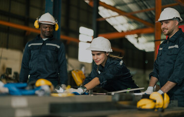 Female robotic technician take on unconventional leadership responsibilities. A workplace that is...