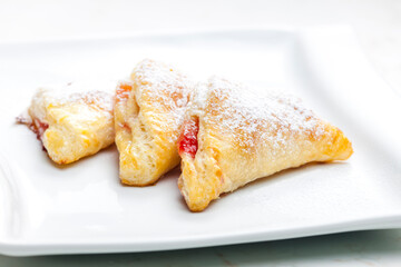 homemade puff pastry filled with strawberry jam - obrazy, fototapety, plakaty