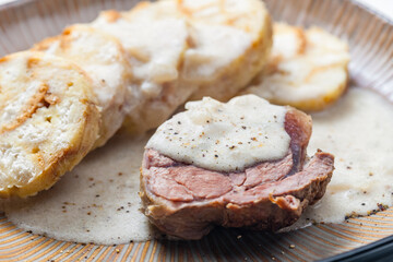 meat with creamy pepper sauce and karlsbad dumplings