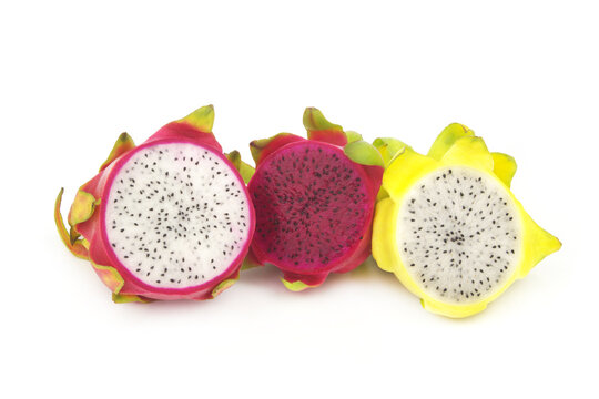 Yellow, red and white dragon fruits isolated on white background.