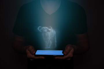 A hologram of a water buffalo projected onto a cell phone held by a man from the future.