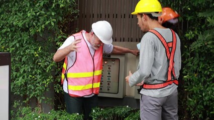 senior electrician worker is injured by the electrical shock. Accident electric shock at workplace