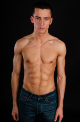 Fototapeta premium Young attractive guy with a nice body.