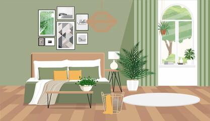Bedroom interior in gray green tones with a ficus and pictures on a white wall © marinadreams