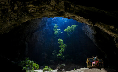 Mystique view to the Phraya Nakhon Cave with the Khuha Kharuehat Pavilion illuminated by Sun through the Hole in the Rocky Top, Thailand