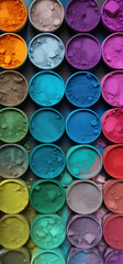 A colorful palette of pigment powders, with rainbow, in the style of enchanting watercolors, light cyan and magenta, raw gorgeous colors, urban decay