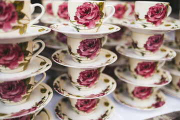 Vintage tea cups stacked on top of each other.