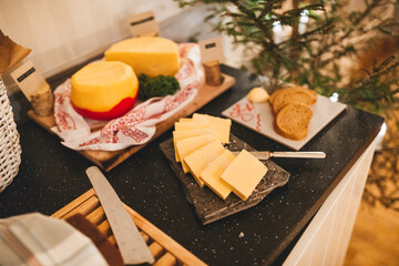 Christmas table filled with bread and cheese.