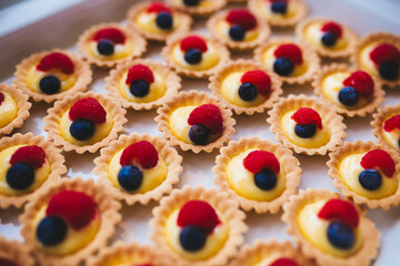 A tray full of small pastries.