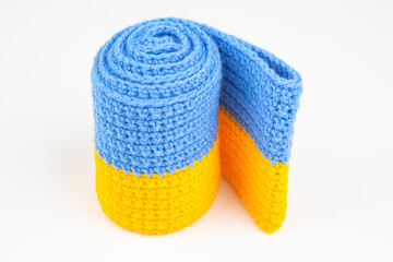 knitted scarf in the form of the Ukrainian flag. national symbols of the country Ukraine