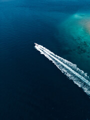 aerial top view luxury yacht sailing in sea .