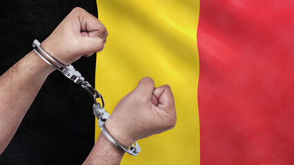 A man getting under arrest in Belgium. Concept of being handcuffed, detained, incarcerated and...