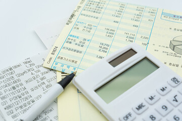 Tax related concept with various utility bills and receipts