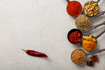 Wooden table of colorful spices. Top view. flat lay, space for your text