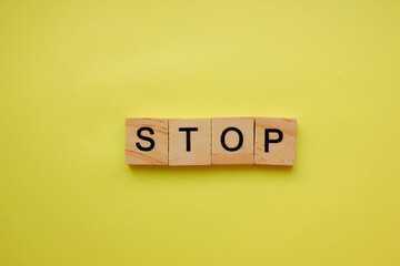 The word STOP on a yellow background.