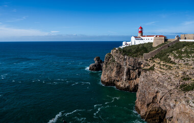 Fototapeta na wymiar Cliffs and Lighthouse of Sagres, Algarve Portugal