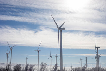 A group of wind turbines generating electricity