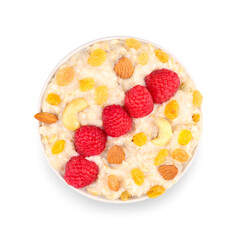 Bowl with tasty oatmeal, raspberries, nuts and raisins isolated on white background