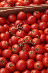 red tomatoes on market stall