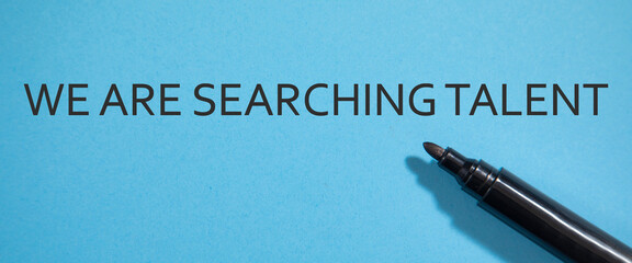 We Are Searching Talent message with a marker.