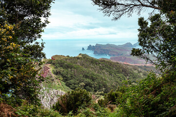 Madeira. Hiking trail Vereda Boca do Risco. Steep Cliffs over the Atlantic Ocean. Near Machico and...