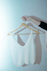 Tank top on a hanger on a white background