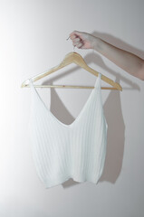 Tank top on a hanger on a white background