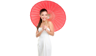 Chinese wedding woman with red paper umbrella. Beautiful mixed race Chinese Asian / Caucasian girl isolated on white background smiling pretty Woman Isolated on transparent background in PNG cutout.