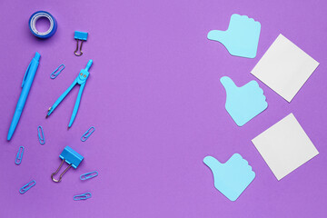 Sticky notes and stationery on purple background