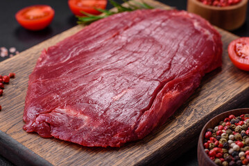 Fresh raw beef with salt, spices and herbs