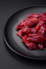 Fresh raw beef with salt, spices and herbs