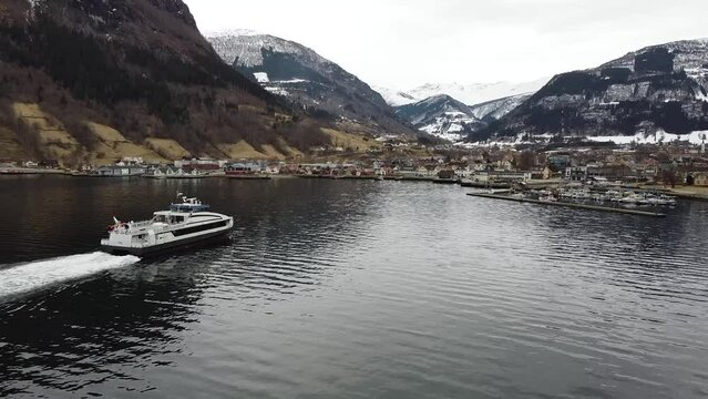 Aerial view of Ferry arriving at dock at Vik&oslash;yri, in Vik i Sogn, Norway.