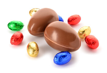 Sweet chocolate Easter eggs and candies isolated on white background